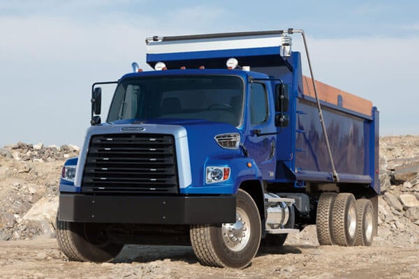 Blue Freightliner dump truck